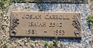 Josiah Carroll's gravestone; it reads, Isaiah 55:12, 1981 to 1993.