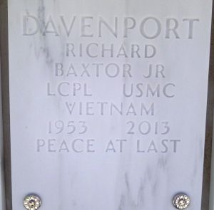 Richard Davenport's gravestone. It reads, "Davenport, Richard Baxtor Jr. Lcpl USMC Vietnam. 1953-2013. Peace at last."