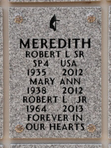 Gravestone reading, Meredith, Robert L Sr, SP4 USA, 1935 2012, Mary Ann, 1938 2012, Robert L Jr,1694, 2013, forever in our hearts.