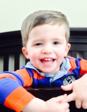 Photo of Tyler Bryan, a toddler boy with fine brown hair and fair skin.