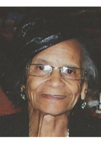 Photo of an older African-American woman wearing glasses.