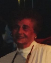 Somewhat indistinct photograph of Nadia Schaible, an elderly woman with short curly hair and fair skin.