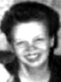 Blurry black-and-white photo of Alice Hummel. She has light skin and dark hair and a big smile.