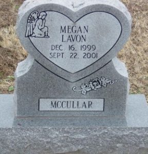 A heart-shaped gravestone reading, "Megan Lavon. December 16, 1999 to September 22, 2001. McCullar."