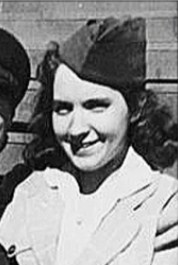 Black and white photo of Leona Twiss, a young woman in old-fashioned clothing. She has curly hair and light skin and is wearing a white blouse and flight attendant's cap.