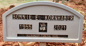 Temporary grave marker reading, Bonnie E. Kornhaber, 1995 to 2021.